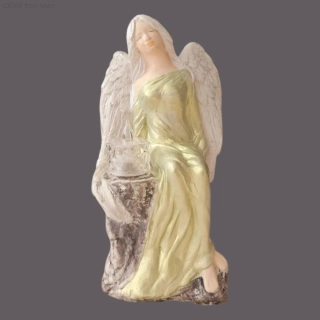 Andělka sedící na kameni s LED čajovou svíčkou zelená 24 cm - sádra